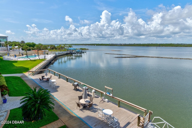 property view of water featuring a boat dock