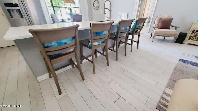 dining room featuring light wood-style floors