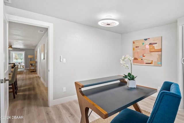 dining space featuring hardwood / wood-style floors