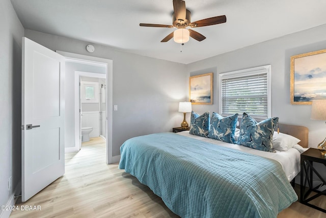 bedroom with ceiling fan and light hardwood / wood-style flooring