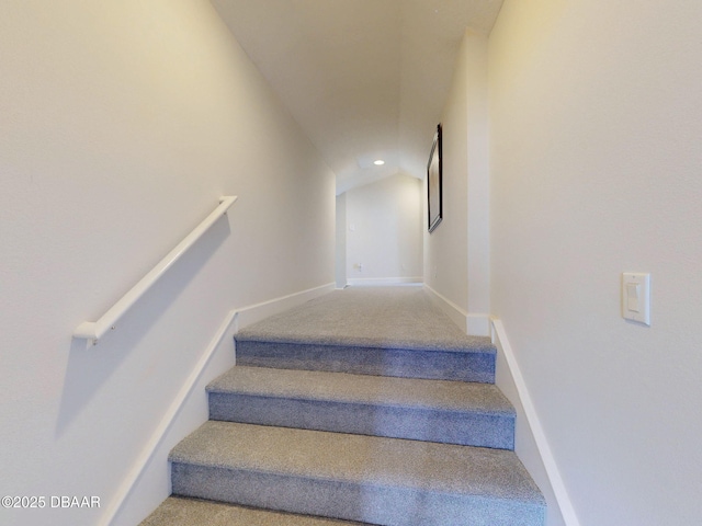 staircase featuring baseboards, carpet flooring, and recessed lighting