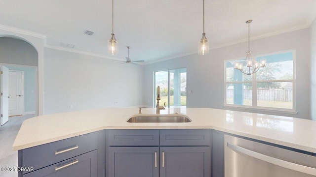 kitchen featuring sink, crown molding, and stainless steel dishwasher