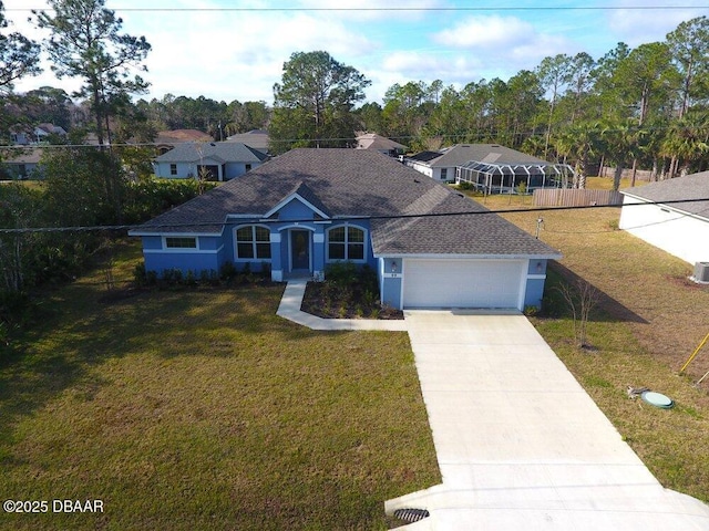 view of front of house featuring a garage, central AC unit, and a front lawn