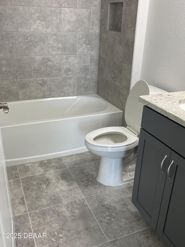 full bathroom with shower / bathing tub combination, vanity, and toilet