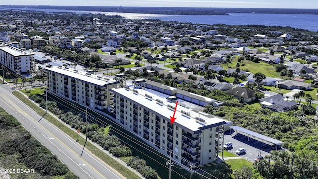 drone / aerial view featuring a water view