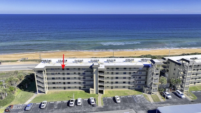 aerial view featuring a beach view and a water view