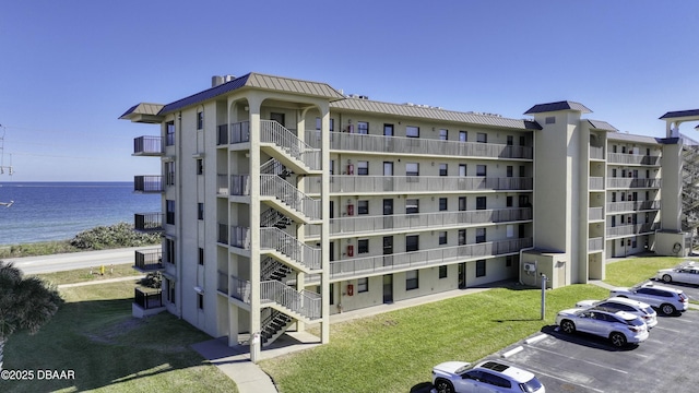 view of property with a water view