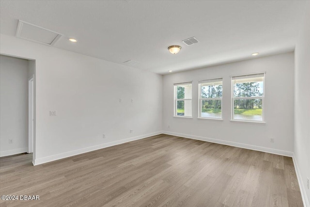 unfurnished room featuring light wood-type flooring