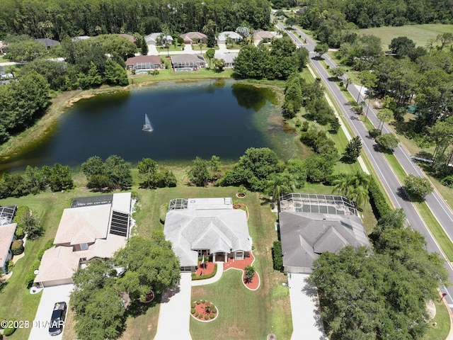 bird's eye view featuring a water view and a residential view