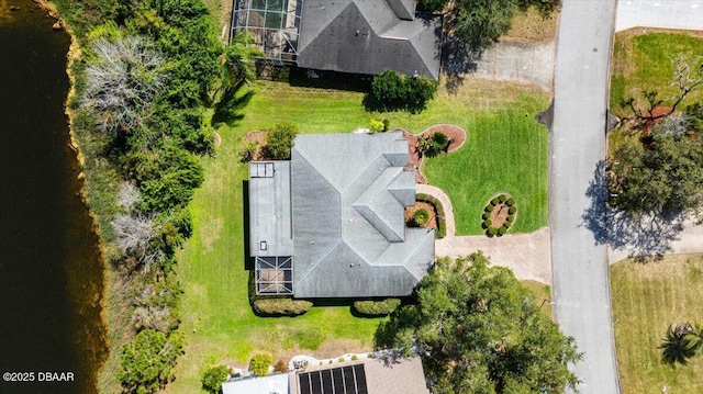 bird's eye view with a water view