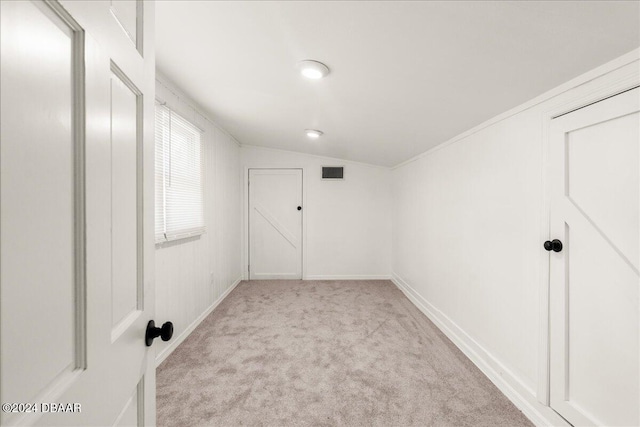 interior space featuring light colored carpet