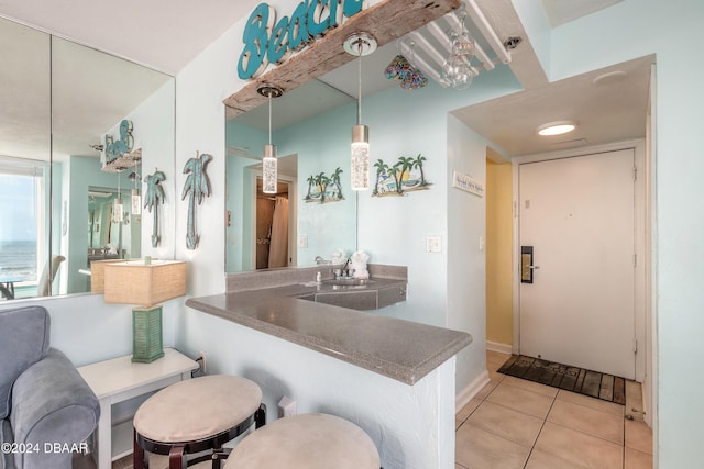 313 S Atlantic Avenue 501 & 503, Daytona Beach, FL 32118 - bathroom with tile patterned floors and a sink