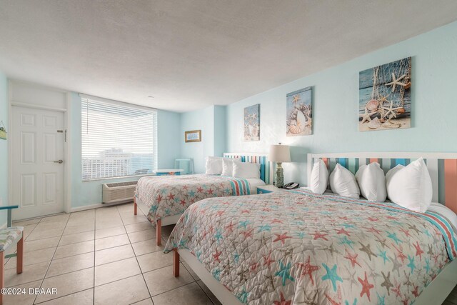 313 S Atlantic Avenue 501 & 503, Daytona Beach, FL 32118 - bedroom featuring tile patterned flooring