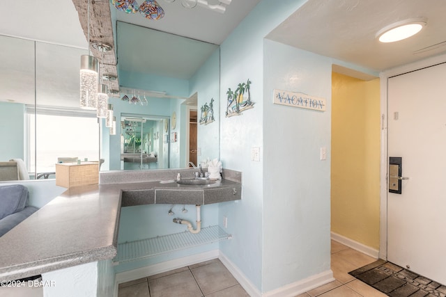 bathroom with sink and tile patterned floors