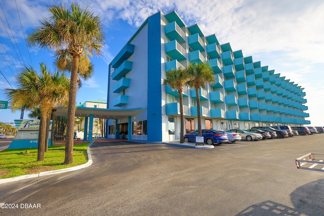 view of building exterior featuring a carport