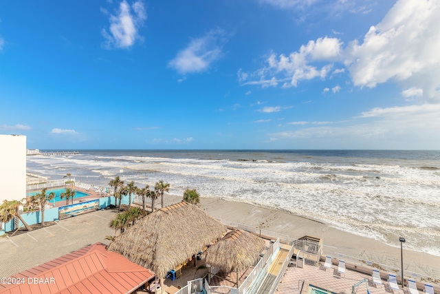 view of water feature with a beach view