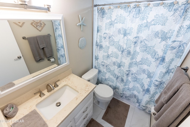 bathroom featuring vanity, a shower with shower curtain, tile patterned flooring, and toilet