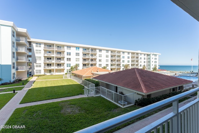 view of property with a water view