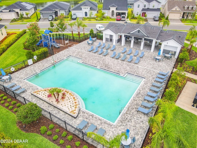 view of swimming pool featuring a patio area