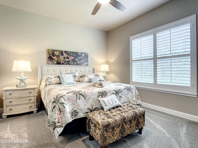 bedroom with ceiling fan and carpet flooring