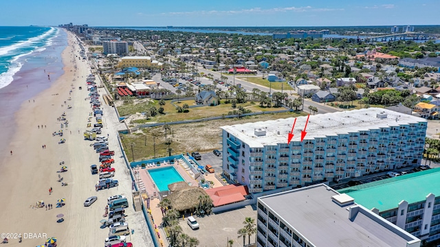 aerial view with a beach view and a water view