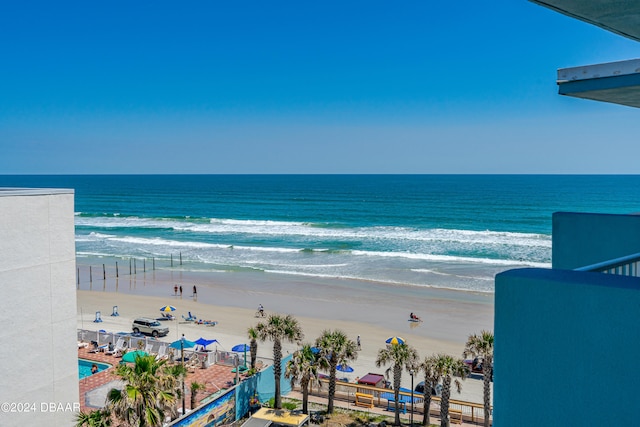 view of water feature with a beach view