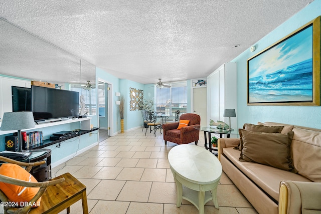 tiled living room featuring a textured ceiling and ceiling fan