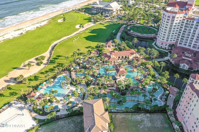 birds eye view of property featuring a view of the beach and a water view