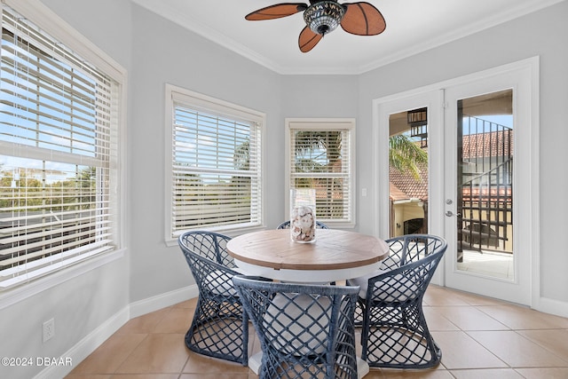 dining space with light tile patterned floors, plenty of natural light, and ceiling fan