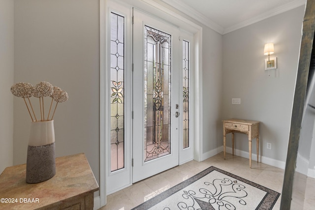 entryway with light tile patterned flooring and ornamental molding