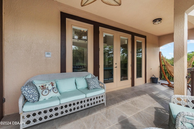 view of patio featuring outdoor lounge area and french doors