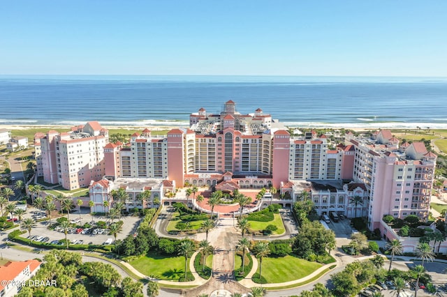 aerial view featuring a water view and a beach view