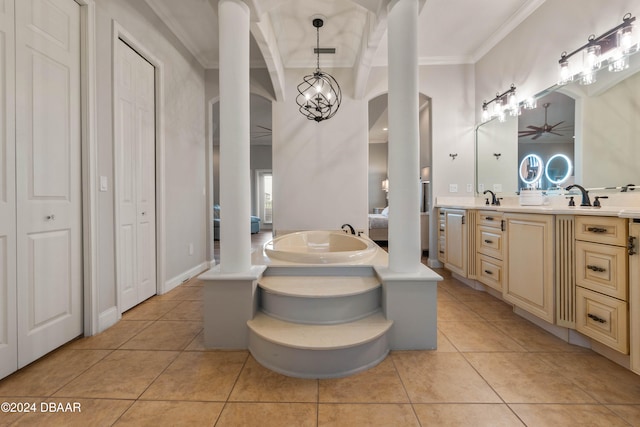 bathroom with tile patterned flooring, vanity, ceiling fan with notable chandelier, and ornamental molding