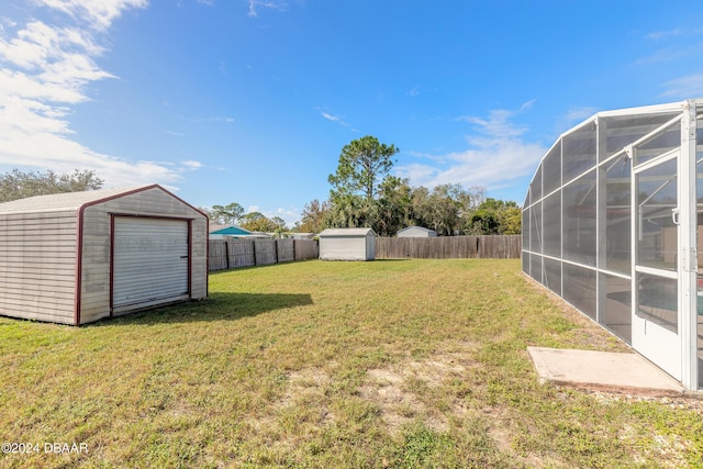 view of yard featuring a storage unit