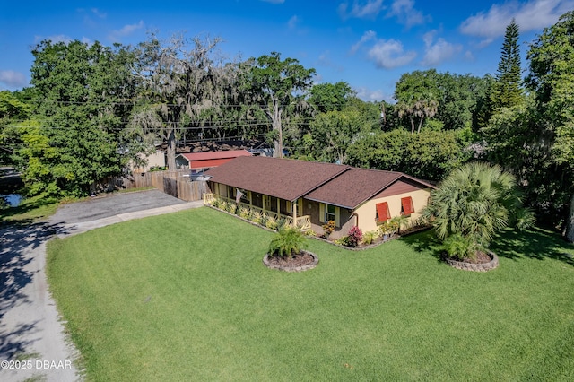 3048 Mango Tree Dr, Edgewater, FL 32141 - ranch-style house featuring asphalt driveway