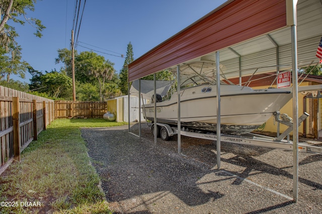 3048 Mango Tree Dr, Edgewater, FL 32141 - fenced backyard featuring a shed and an outdoor structure