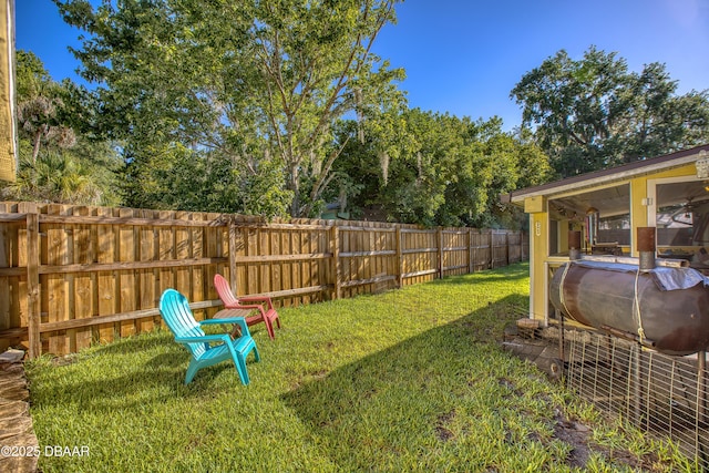 3048 Mango Tree Dr, Edgewater, FL 32141 - view of yard featuring oil tank