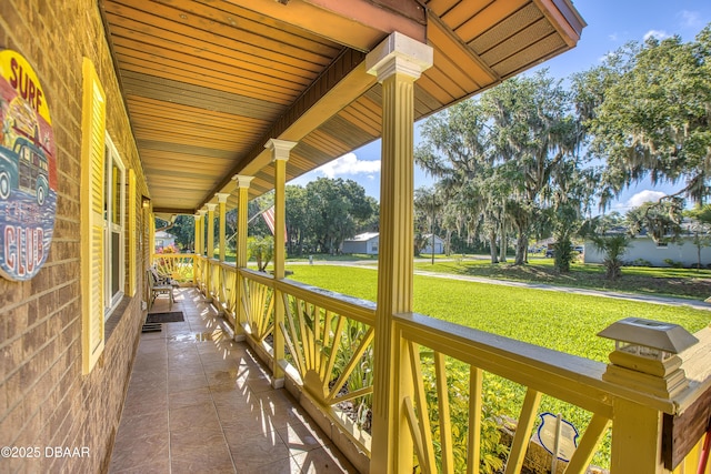 3048 Mango Tree Dr, Edgewater, FL 32141 - view of patio / terrace featuring covered porch