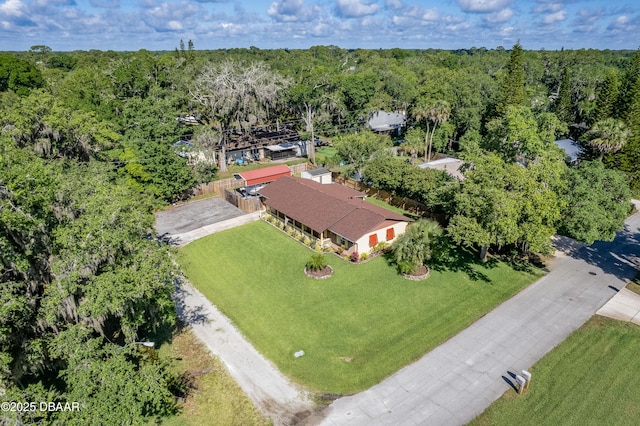 3048 Mango Tree Dr, Edgewater, FL 32141 - view from above of property with a heavily wooded area