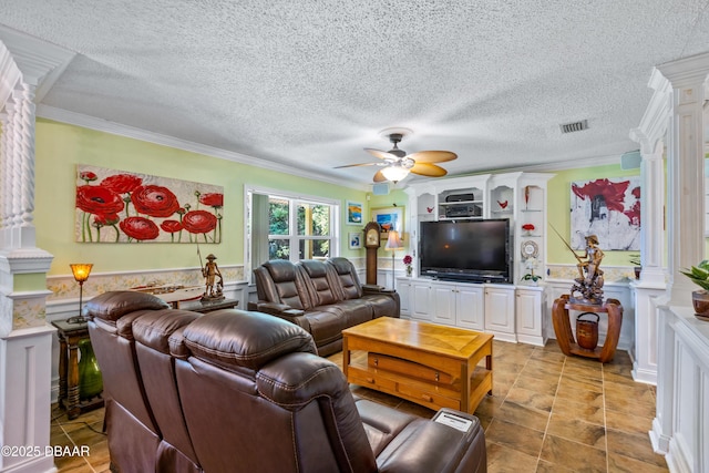 3048 Mango Tree Dr, Edgewater, FL 32141 - living room featuring ornate columns, ornamental molding, a ceiling fan, a wainscoted wall, and a textured ceiling