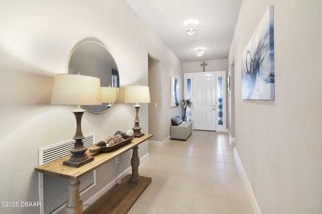 6279 W Fallsgrove Ln, Port Orange, FL 32128 - foyer entrance with baseboards and light tile patterned flooring