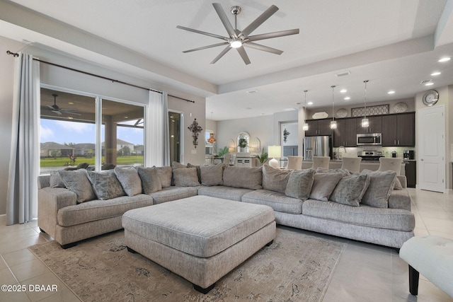 6279 W Fallsgrove Ln, Port Orange, FL 32128 - living room featuring ceiling fan, light tile patterned floors, and recessed lighting