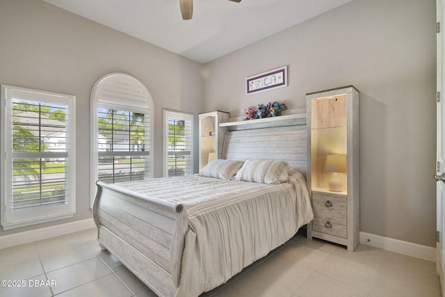 6279 W Fallsgrove Ln, Port Orange, FL 32128 - bedroom with light tile patterned floors and ceiling fan
