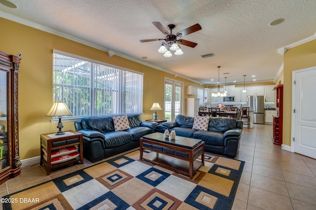 10 Cantilever Ct, Ormond Beach, FL 32174 - living area featuring ornamental molding, ceiling fan, light tile patterned floors, a textured ceiling, and baseboards