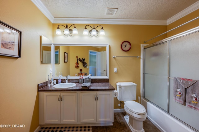 10 Cantilever Ct, Ormond Beach, FL 32174 - bathroom with ornamental molding, vanity, toilet, a textured ceiling, and combined bath / shower with glass door