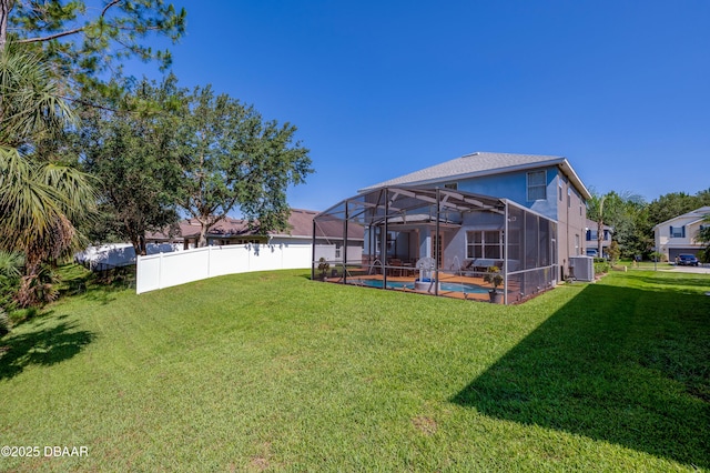 10 Cantilever Ct, Ormond Beach, FL 32174 - view of yard featuring cooling unit, glass enclosure, and a patio area