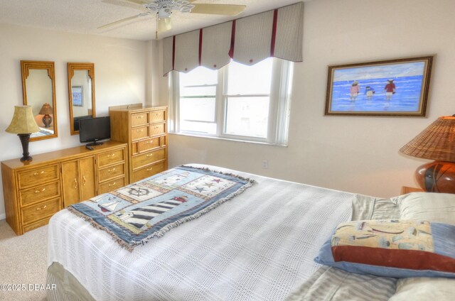 4435 S Atlantic Ave Unit 416, Ponce Inlet, FL 32127 - bedroom with carpet flooring and a ceiling fan