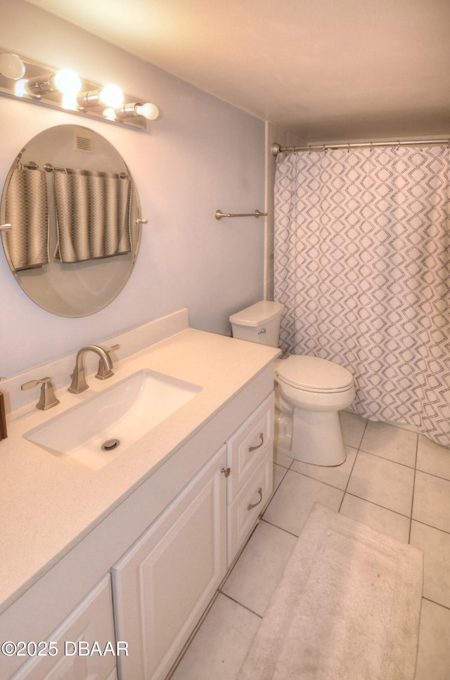 4435 S Atlantic Ave Unit 416, Ponce Inlet, FL 32127 - bathroom featuring vanity, tile patterned floors, and a shower with curtain