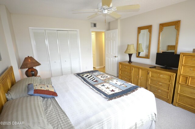 4435 S Atlantic Ave Unit 416, Ponce Inlet, FL 32127 - carpeted bedroom with a closet and a ceiling fan