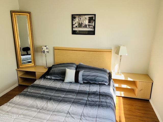 bedroom featuring hardwood / wood-style floors